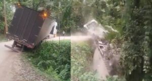 Carreta tomba em ‘câmera lenta’ em barranco de SC